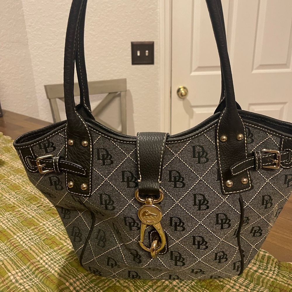 Dooney and Bourke logo lock handbag